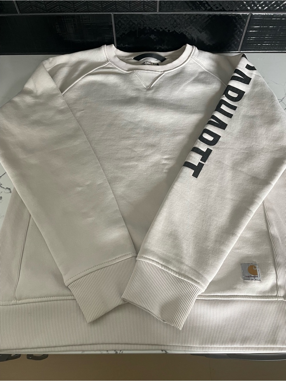 Carhartt Women’s Cream Crewneck with Black Sleeve Logo